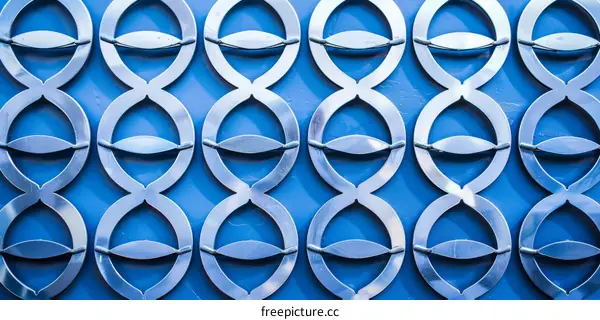 Abstract Geometric Blue Metal Fence with Interlocking Circles