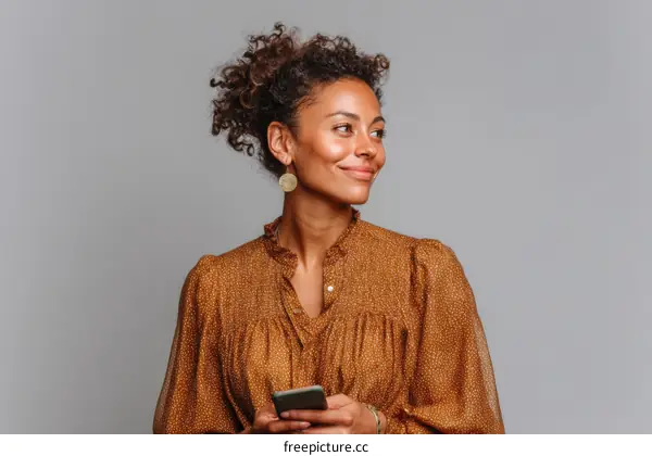 Confident Black Woman Holding Phone