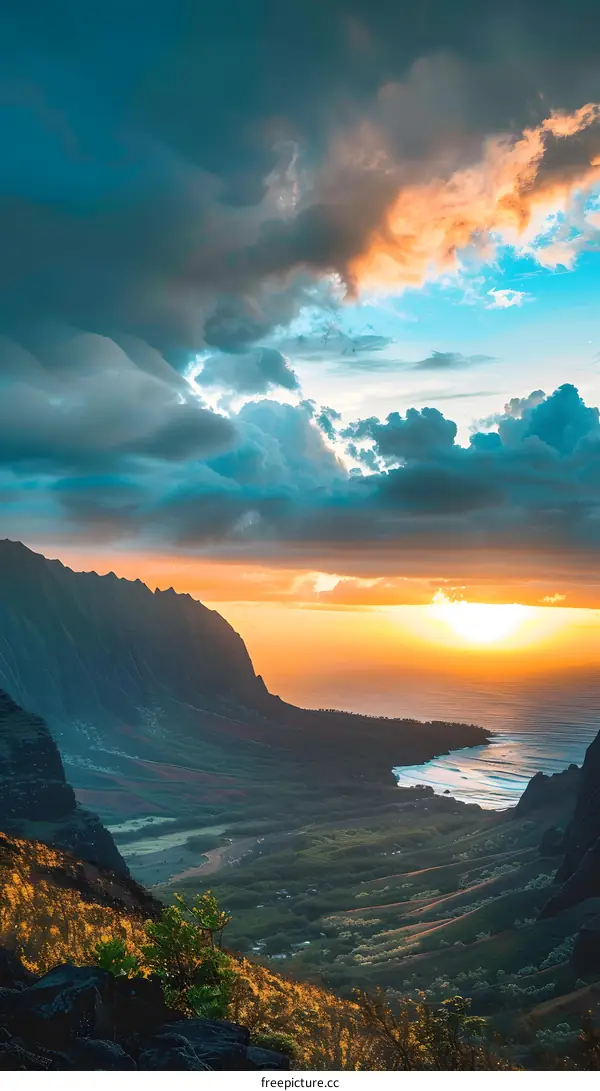 Sunset Over Mountains And Ocean