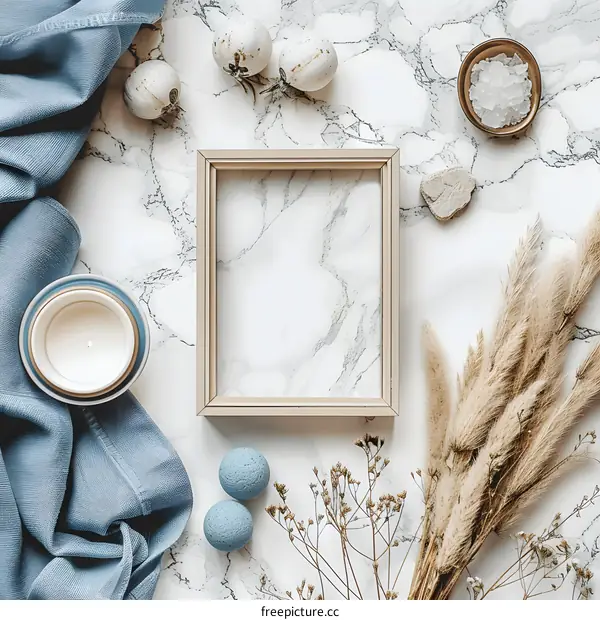 Minimalist Flat Lay with Frame and Dried Flowers on Marble Background