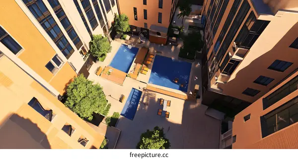 Aerial View of City Courtyard with Swimming Pools