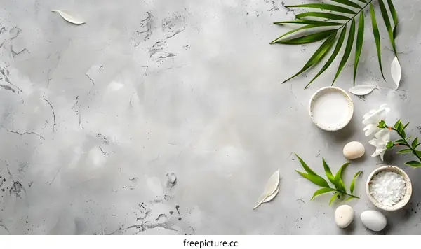 White Flowers and Green Leaves on Grey Background