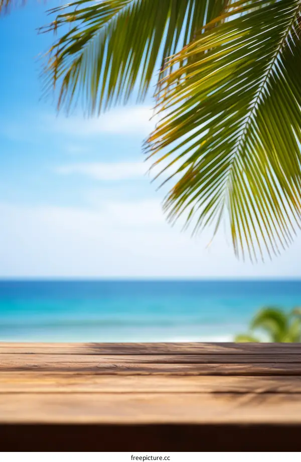 Tropical Beach with Palm Tree Leaves and Wooden Table