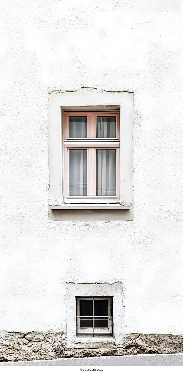 Old White Wall with Two Windows
