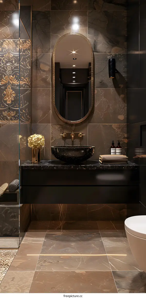 Luxurious Bathroom with Dark Marble Tiles, Golden Mirror and Sink
