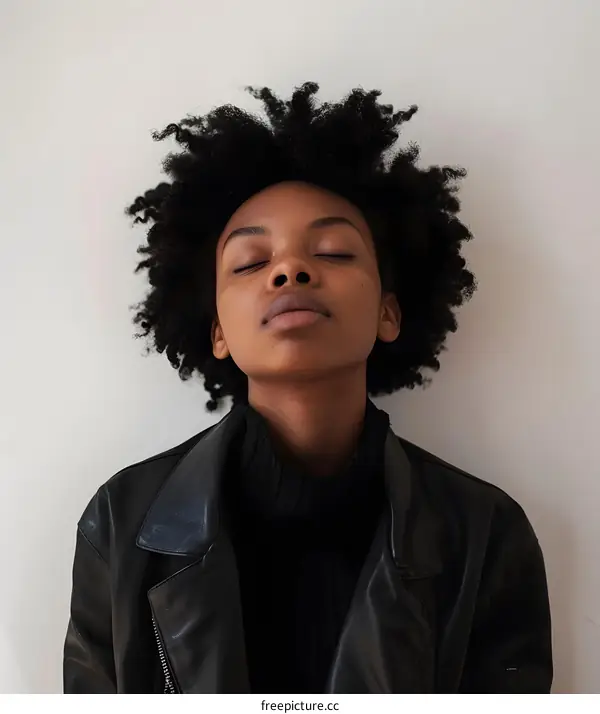 Portrait of a Black Woman in a Black Leather Jacket
