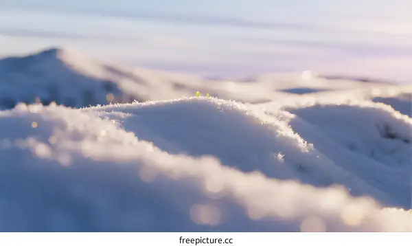 Sunlit Snowy Mountain Peaks with Soft Frosted Textures