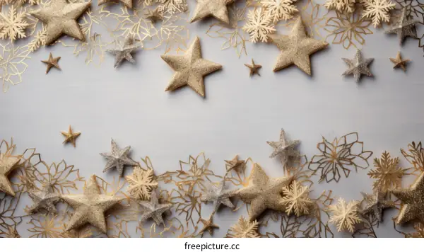 Christmas background with golden stars and snowflakes