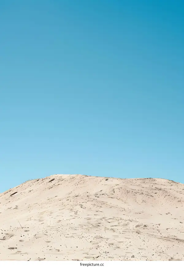 Minimalist Desert Landscape with Clear Blue Sky