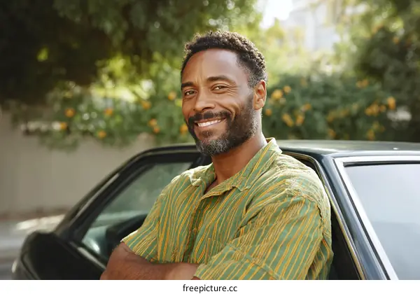 Smiling Man Leaning Against Car Outdoor Portrait