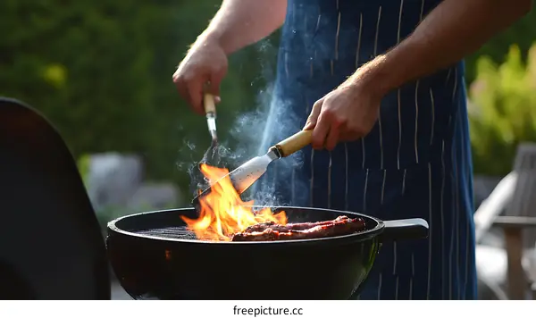 Man Grilling Food on Barbecue Grill