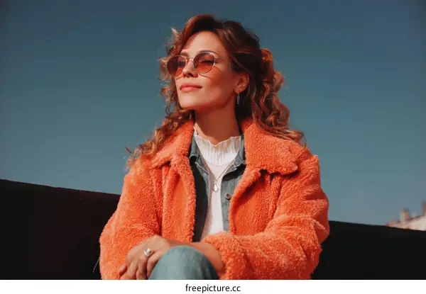 Stylish Woman in Coral Jacket Outdoor Portrait