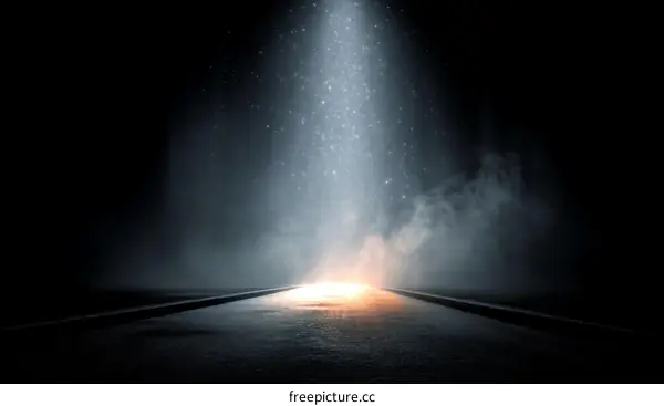 Empty Roadway Under a Powerful Light