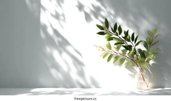 Elegant Greenery Arrangement Against a Light Wall