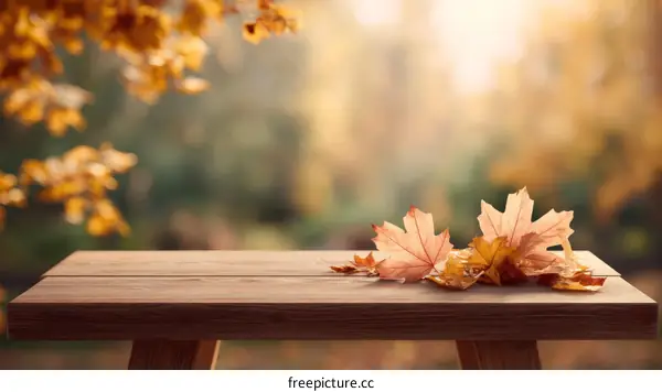 Autumn Leaves on Wooden Table Outdoors