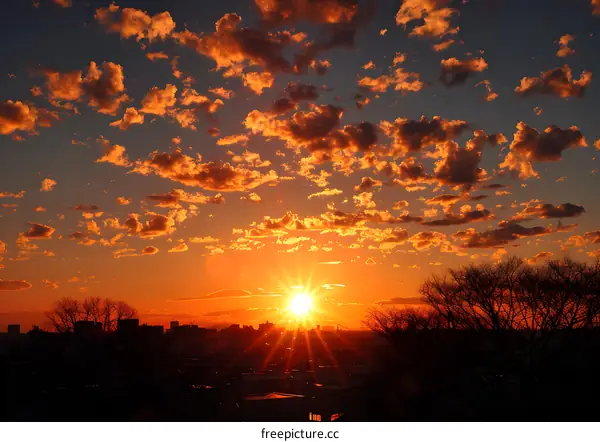 Fiery Sunset over Cityscape