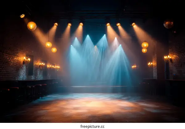 Empty Stage with Dramatic Lighting in a Brick-walled Venue