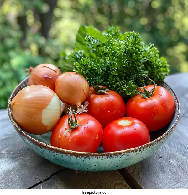 A bowl of fresh vegetables including tomatoes, onions, and parsley