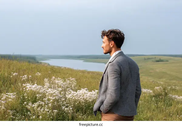 Caucasian Man Contemplating Scenic Landscape