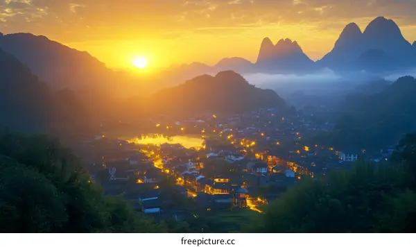 Sunrise over a Chinese Village nestled in Valley