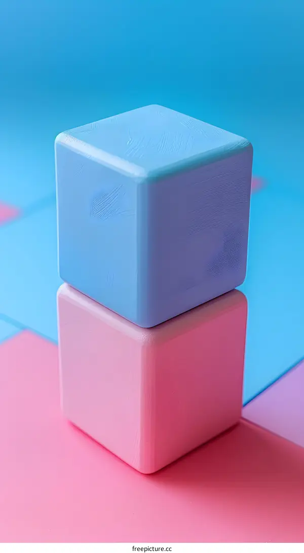 Two pastel cubes stacked on a pink and blue background