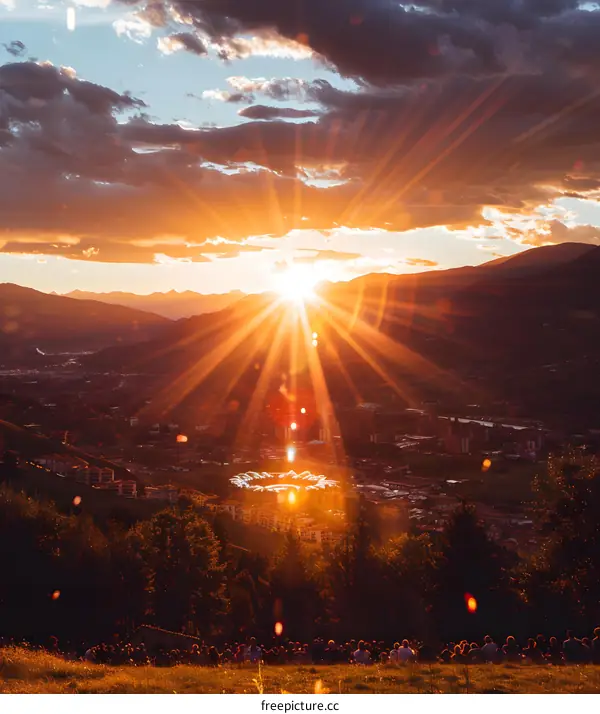 Golden Sunset Over Mountains and City
