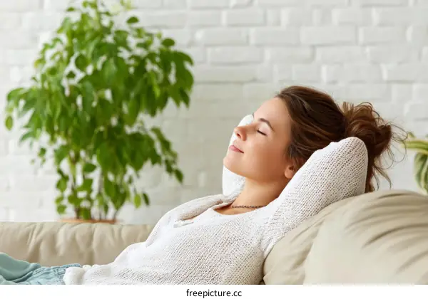 Relaxing Woman on a Couch in a Cozy Home