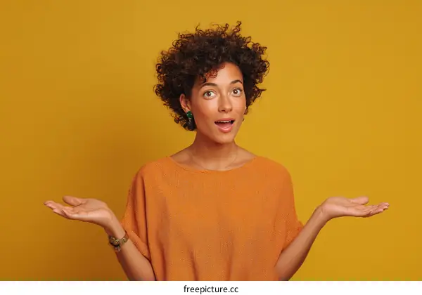 Surprised Woman Presenting on a Vivid Yellow Background