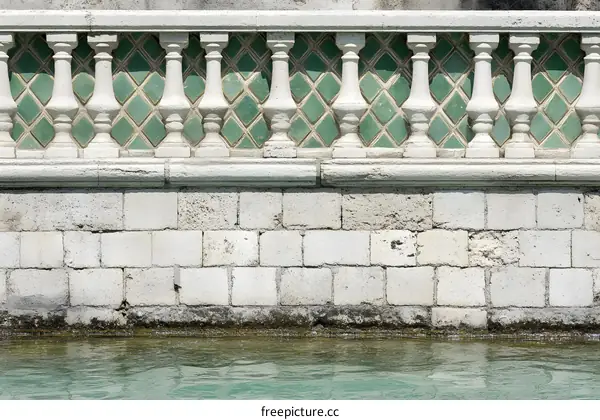 Stone Wall with Green Tile Detail
