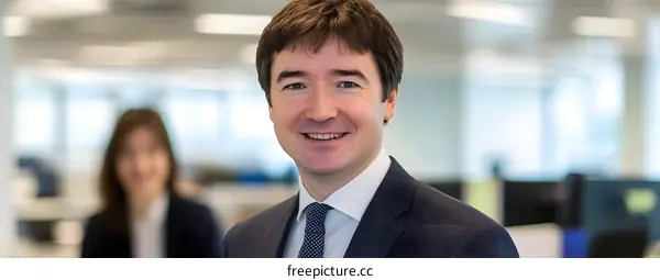 Smiling Businessman Portrait in Office
