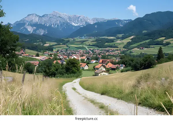 Countryside landscape with mountain and village