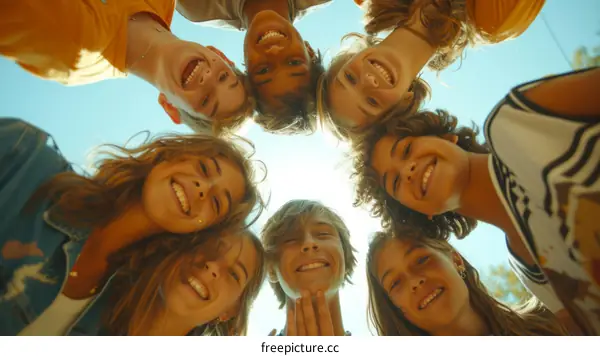 Multiethnic group of happy children looking down at camera