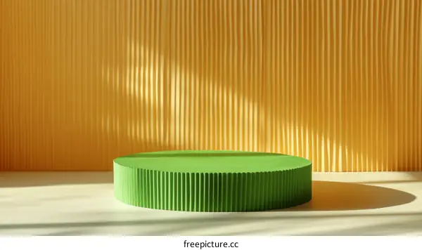 Green Round Display Podium Against Yellow Striped Wall