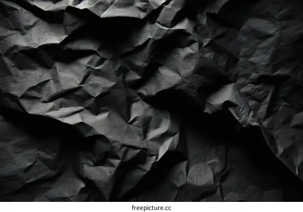 Textured Black Crumpled Paper Background