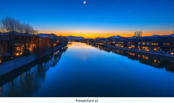 Serene Riverbank Town at Dawn