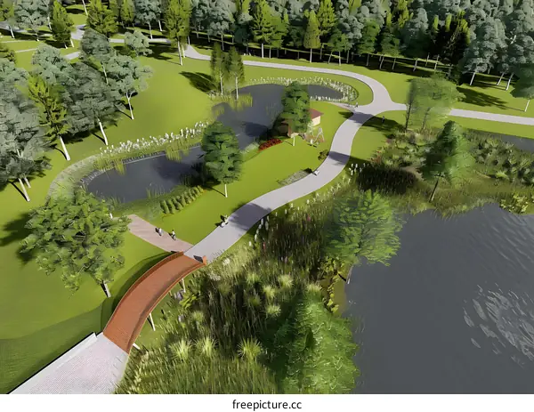 Aerial View of a Park with Winding Path and Two Ponds