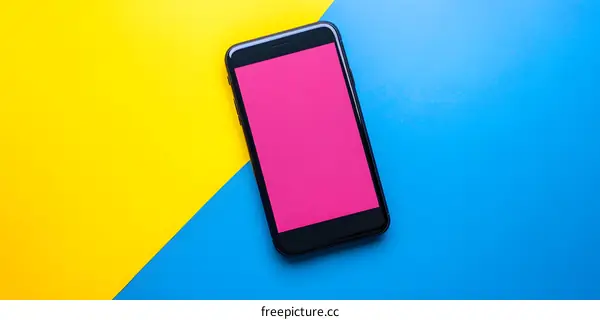 Black Smartphone on Yellow and Blue Background
