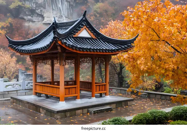 Traditional Chinese Pagoda Surrounded by Autumn Foliage