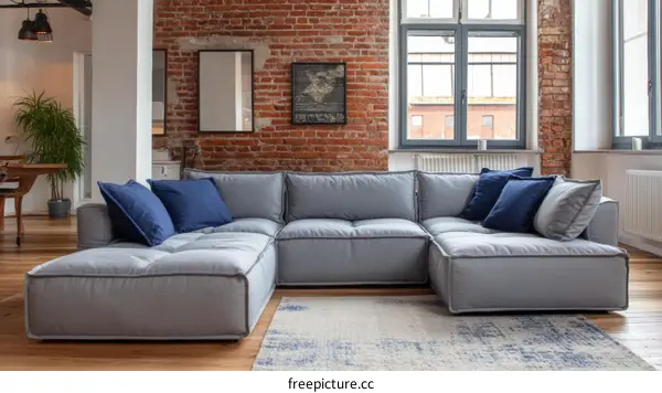 Modern Grey Sectional Sofa in a Loft Apartment