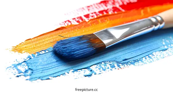 Blue Paintbrush on Colorful Paint Strokes