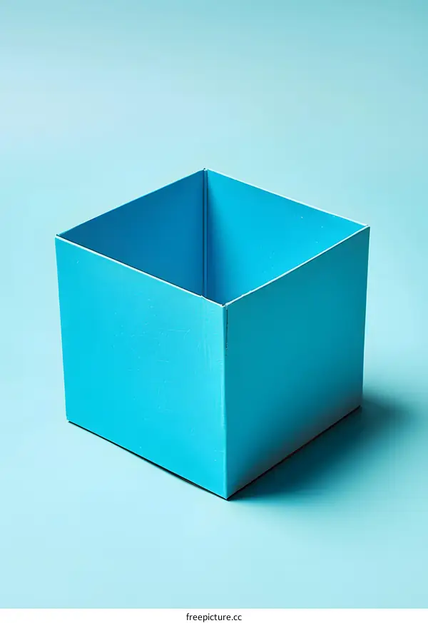 Empty Blue Cardboard Box On A Blue Background