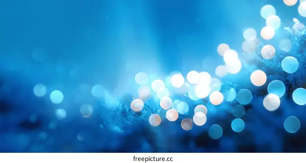 Abstract Blue Festive Background with Bokeh Lights