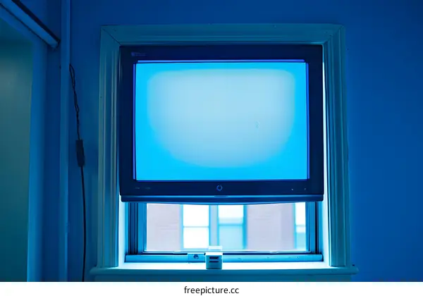 Blue Television Screen In Window