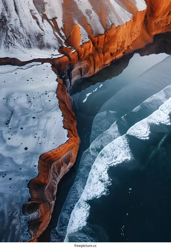 Aerial View of Frozen Lake and Red Cliffs