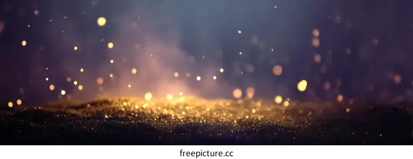 Golden Glitter Background with Bokeh Effect