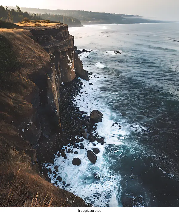Ocean Coastline With Waves Crashing On Rocky Shore