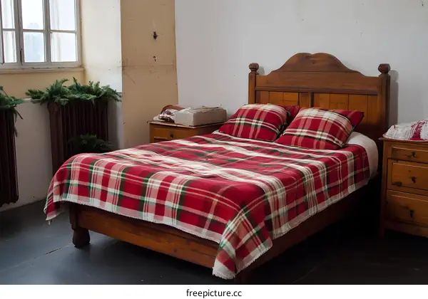 Red Plaid Bedspread in a Rustic Bedroom