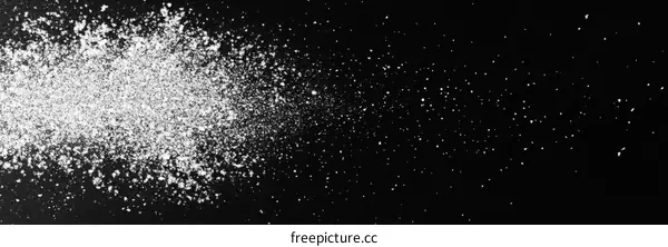Abstract White Powder Explosion on Black Background