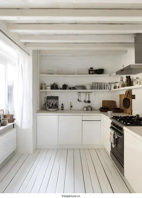 White Kitchen with Exposed Brick Wall and Wooden Beams
