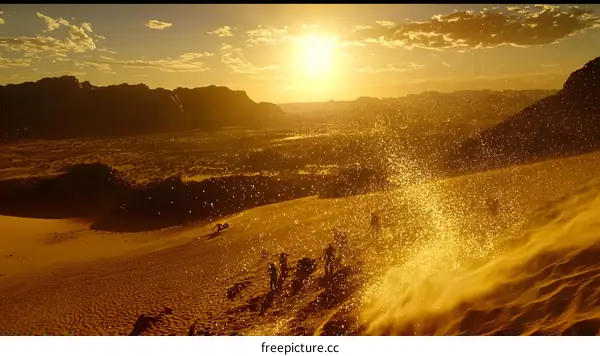 Desert Sunset with People Walking on Sand Dunes
